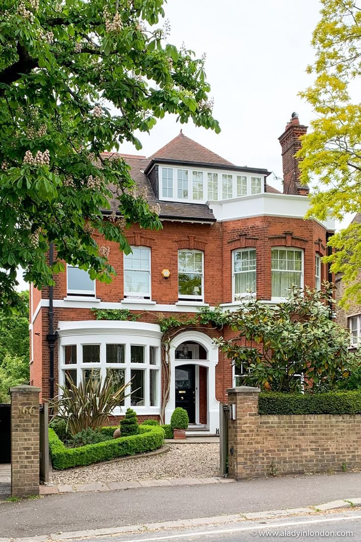 Traditional brick UK house with full guttering system